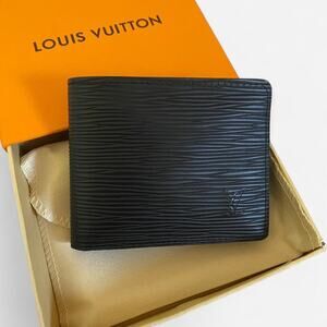 Louis Vuitton Epi Leather Multiple Wallet model M60662